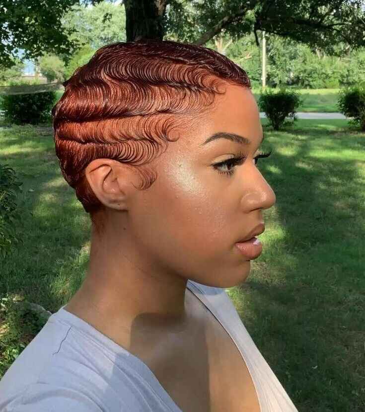 black woman red short hair waves