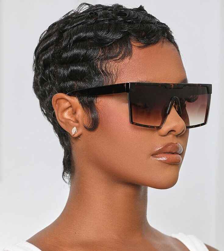 black woman black short hair waves